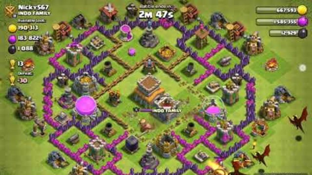 Playing clash of clans (base review)
