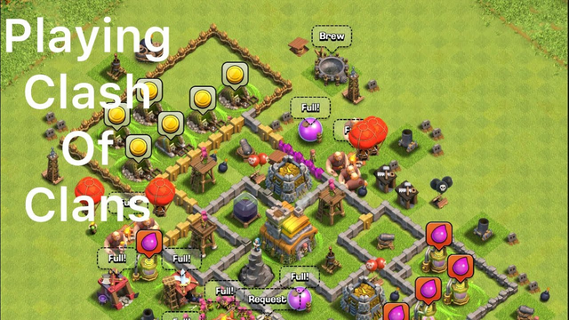 Playing clash of clans (first clash of clan video)