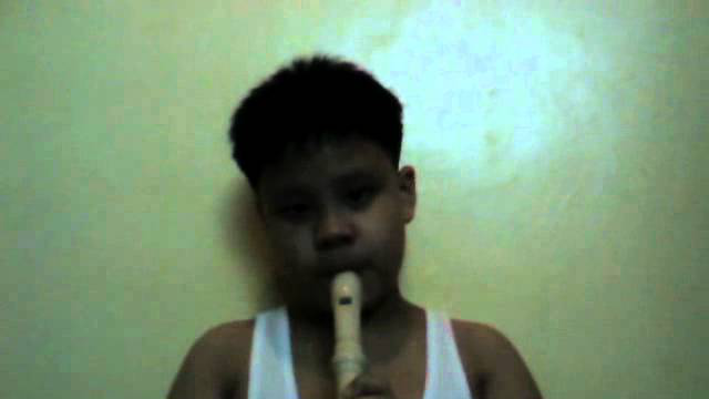 Coco playing the Recorder